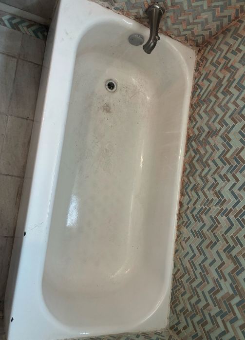 Before: worn bathtub finish