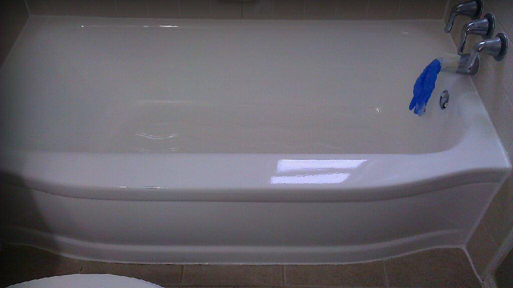 After: glossy, seamless liquid tub liner finish